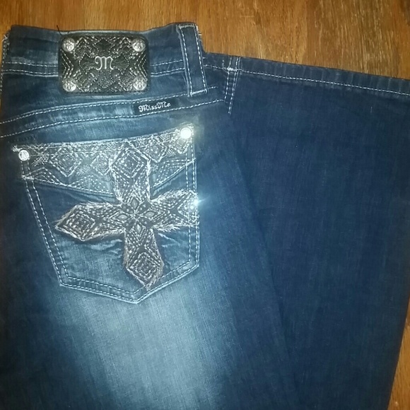 Women's size 31 mid-rise curvy boot cut jeans