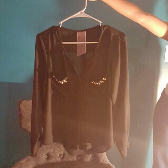 Sheer shirt was studs on the pocket