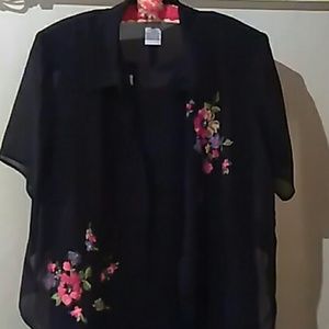 Black dress with a jacket with floral print on it