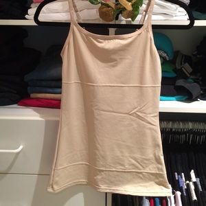 Nude adjustable strap tank.