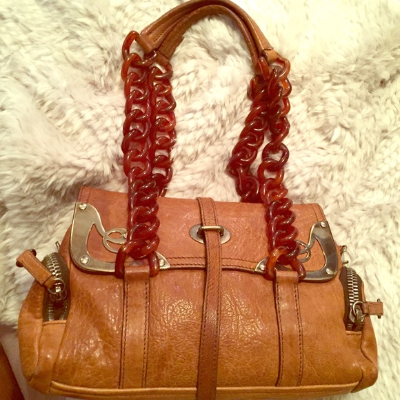Miu Miu tortoise handle purse. Limited edition