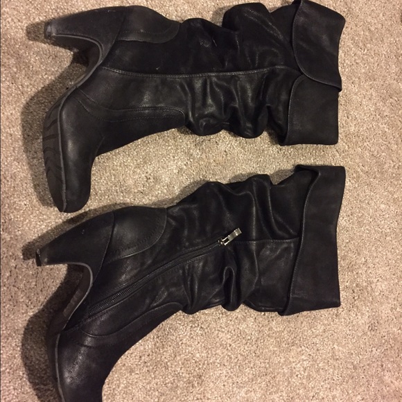 Slouchy black heeled boots