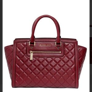 Red micheal kors quilted bag