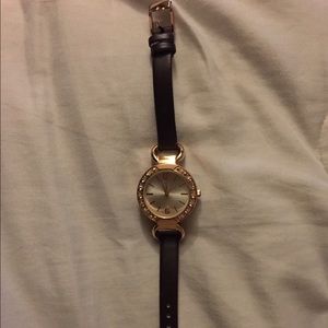 Real rose gold w. Brown leather straps.