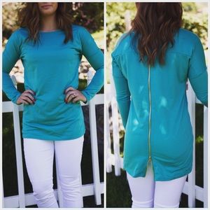 Turquoise zipper-back tunic.
