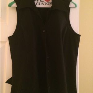 Sleeveless top with black belt with silver close