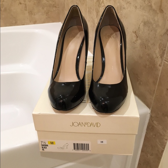 Black patent leather pumps.