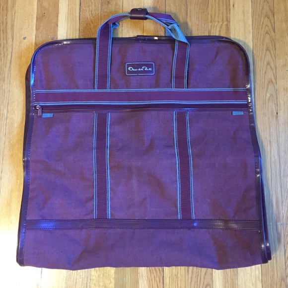 Oscar de la Renta clothing carrier