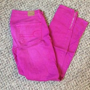 Pink skinny jeans with zipper on bottom