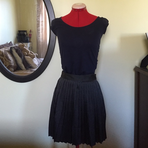 H&M Black pleated skirt with white polka dots.