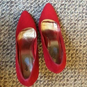 Red felt pumps
