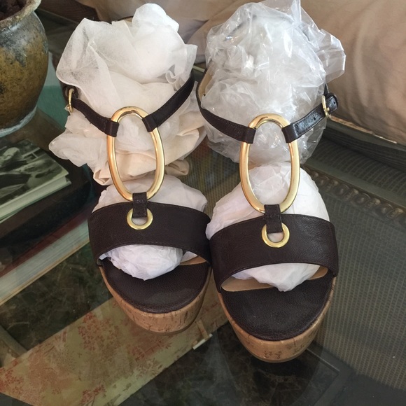 Women's brown and gold wedge shoes