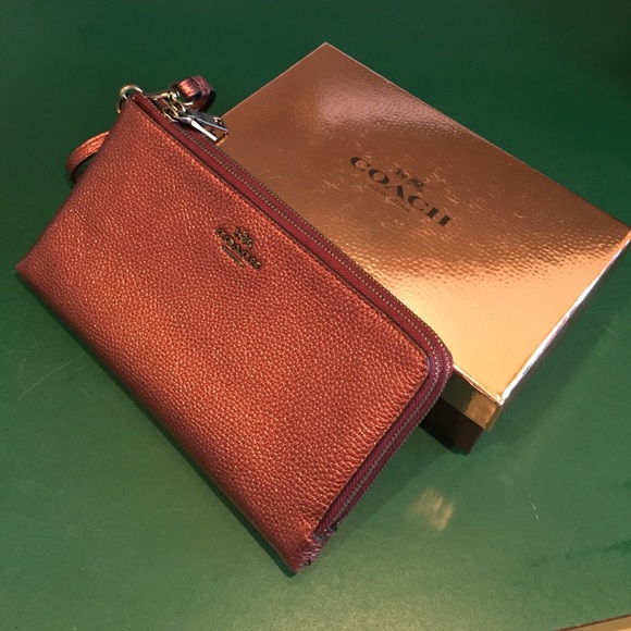 NWOT ROSE GOLD COACH WRISTLET