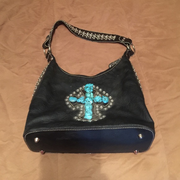 Black purse with bling and turquoise cross