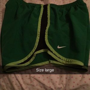 Green and black Nike Fit Shorts