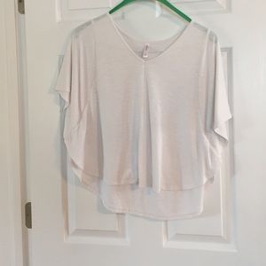 Cute crop top that looks great with a colored cami