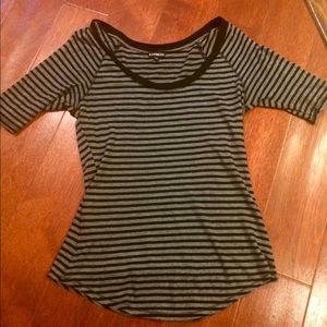 Cute tee! Goes great with skinny jeans!