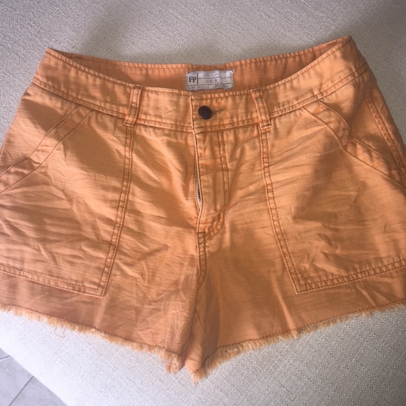 Free People orange frayed edge shorts