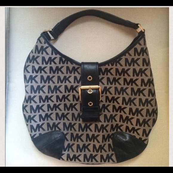 Michael Kors MK over the shoulder handbag
