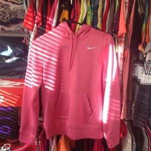 small pink nike sweatshirt