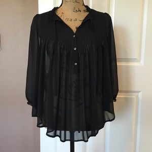 Sheer black blouse