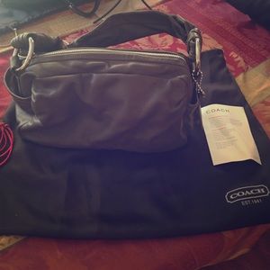 brown shoulder coach purse