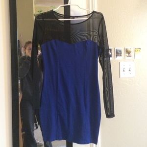 Blue body con dress with sheer black sleeves