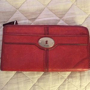 Red Fossil wallet top zip style lightly used
