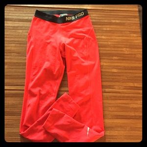 Red Nike Pros. Size: XS