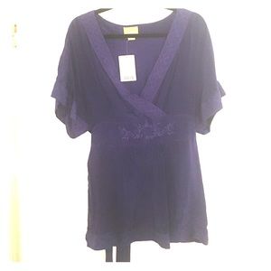 Purple v-neck shirt with tie waist. Size 12