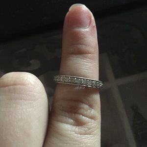 Diamond and white gold wedding band.