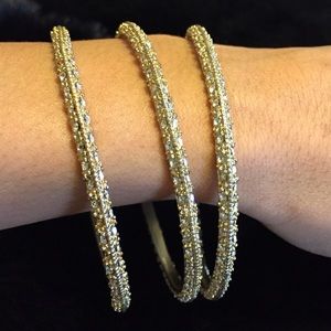 3 Gold toned bangles with rhinestone