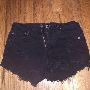 Hugh waited black shorts with rips