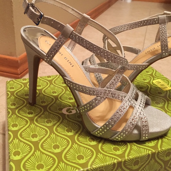 GIANNI BINI silver heels. Never worn!! Size 7.5