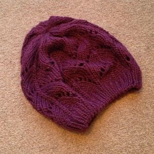Purple knit beanie hat