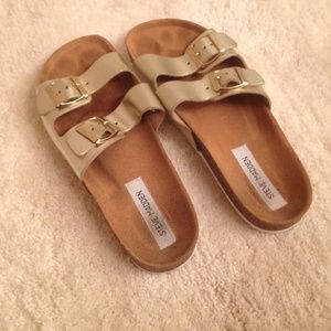 Steve Madden Birkenstocks with gold straps