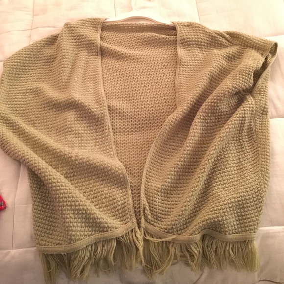 Sweater material cardigan with no sleves