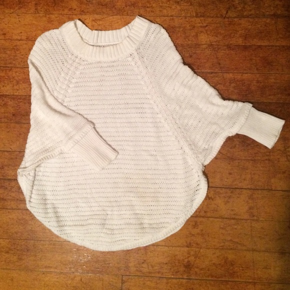 White poncho sweater