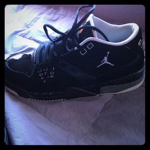 Black with white trim Jordans