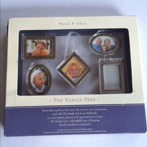 Five small hanging picture frames