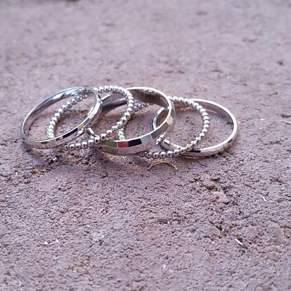 New, set of 5 sterling silver midi rings, size 6