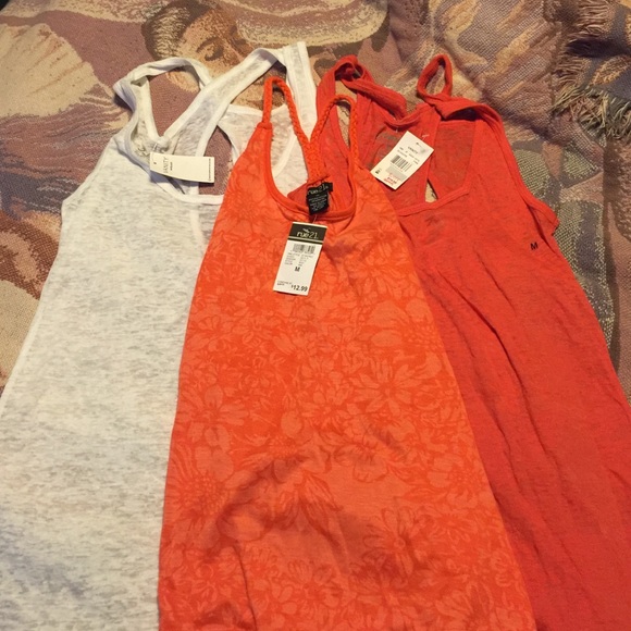 Three new with tags tank tops