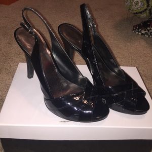 Open toe black pumps