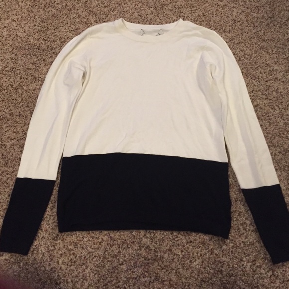 black and cream sweater.