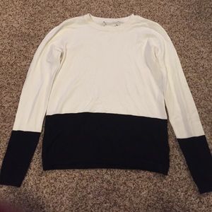 black and cream sweater.