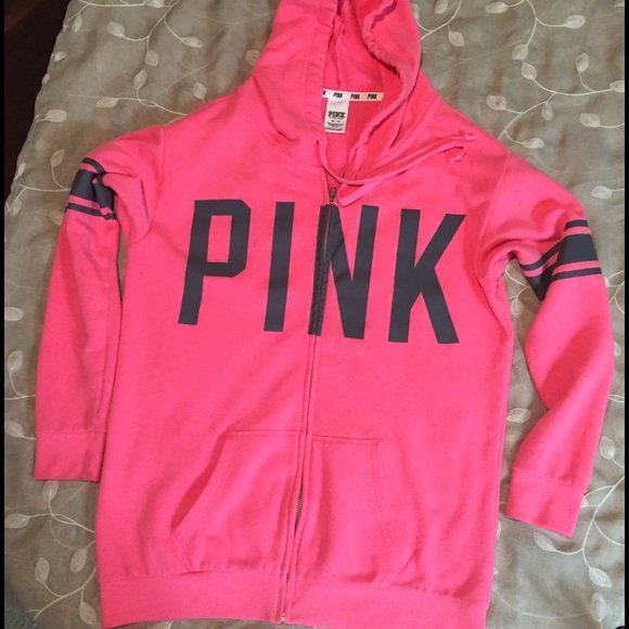 Pink hoodie on coral bright color