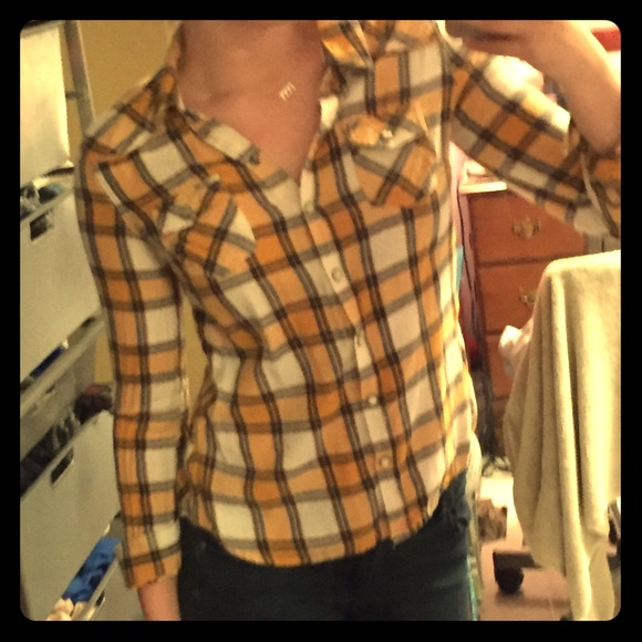 Cute and cozy flannel top!