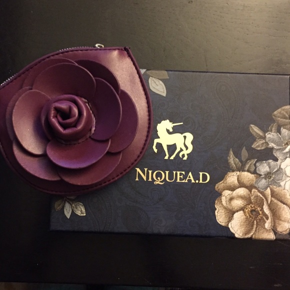 Niquea.d rosette wristlet