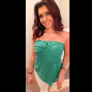Green sleeveless peplum top - Size small