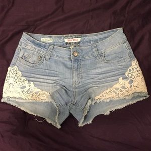 Jean shorts with lace detail on sides